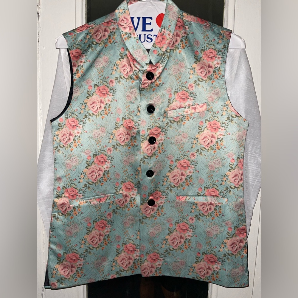 Printed floral Nehru vest with matching off-white colored kurta shirt and pants.